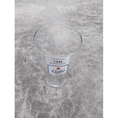 1343 - Guinness Light glass {15 cm H x 9 cm Dia}.