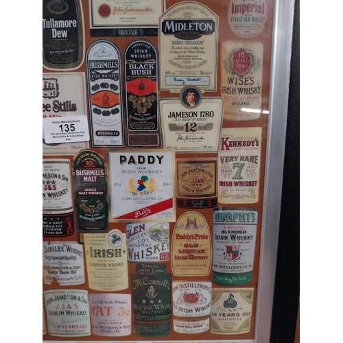 135 - Framed montage  print of Irish and Scotch Whiskey labels. {50 cm H x 37 cm W}.