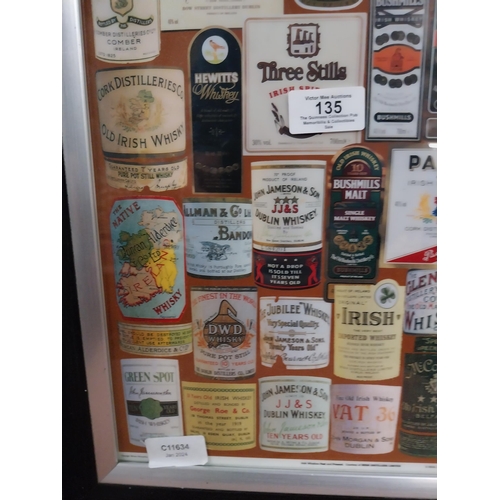 135 - Framed montage  print of Irish and Scotch Whiskey labels. {50 cm H x 37 cm W}.