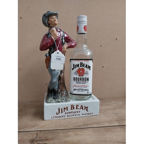 1353 - Jim Beam Kentucky Bourbon ceramic advertising bottle holder in the form of a Cowboy and bottle. {34 ... 