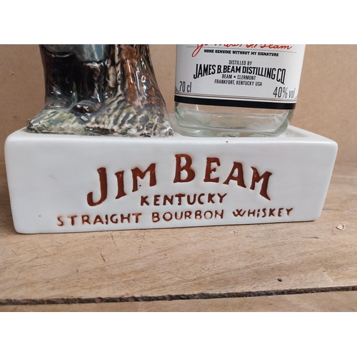 1353 - Jim Beam Kentucky Bourbon ceramic advertising bottle holder in the form of a Cowboy and bottle. {34 ... 