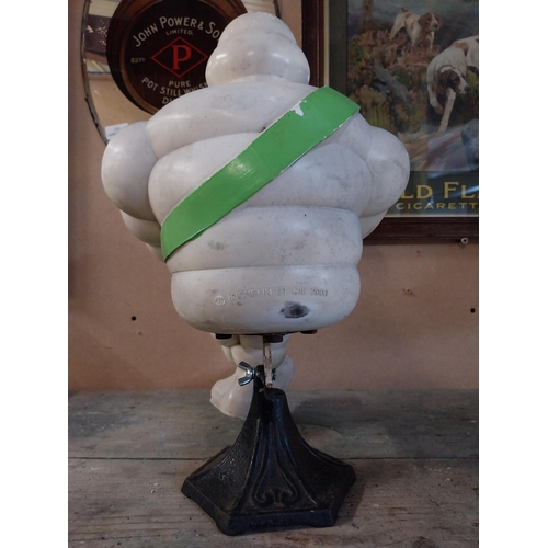 1364 - Michelin Man advertising figure on metal stand. {49 cm H x 29 cm W}