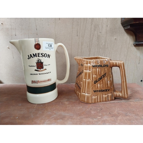 138 - Bushmills Whiskey Arklow advertising jug {11 cm h x 15 cm W x 11 cm D} and Jameson Whiskey Eastgate ... 