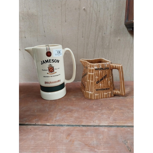 138 - Bushmills Whiskey Arklow advertising jug {11 cm h x 15 cm W x 11 cm D} and Jameson Whiskey Eastgate ... 