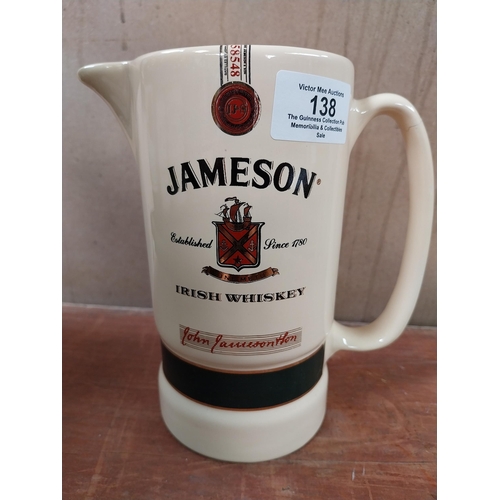 138 - Bushmills Whiskey Arklow advertising jug {11 cm h x 15 cm W x 11 cm D} and Jameson Whiskey Eastgate ... 