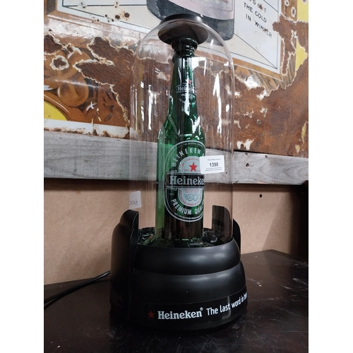 1390 - Heineken Lager counter font light up box. {30 cm H x 19 cm Dia.}.