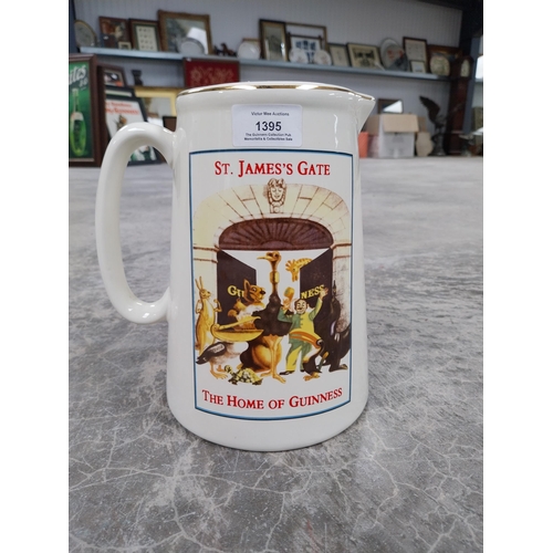 1395 - Guinness ceramic advertising water jug. {32 cm H x 18 cm W x 15 cm D}.