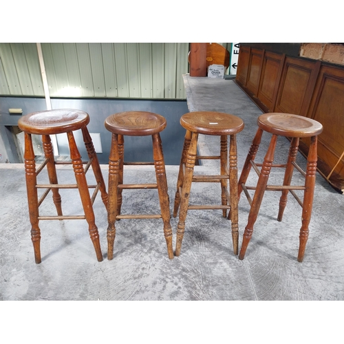 1399 - Four Early 1930's bar stools with dished seat. {70 cm H x 34 cm Dia.}.