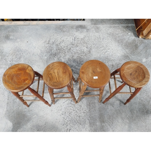 1399 - Four Early 1930's bar stools with dished seat. {70 cm H x 34 cm Dia.}.