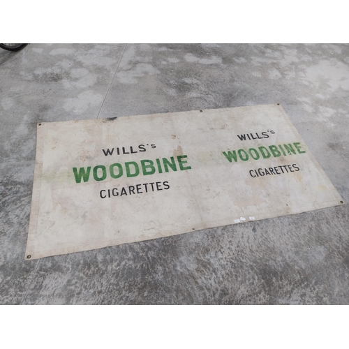 1417 - Wills's Woodbine cigarettes advertising banner. {119 cm H x 227 cm W}.