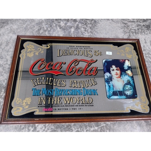 1418 - 1970's Coca Cola framed advertising mirror. {56 cm H x 86 cm W].