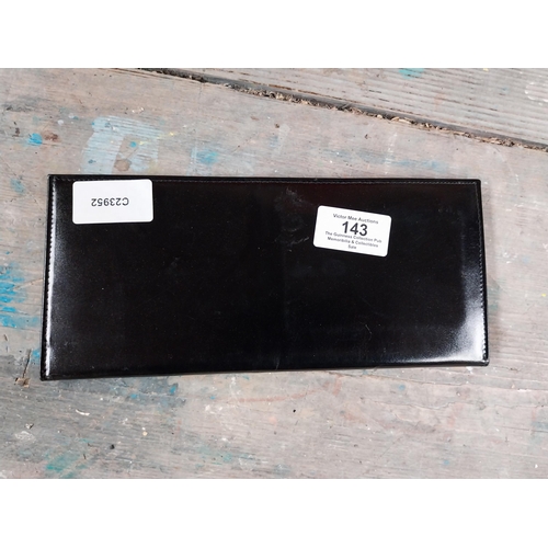 143 - Bass wallet. {10 cm H x 32 cm W}.