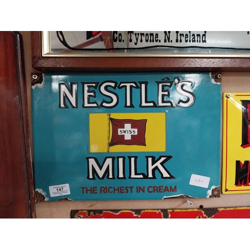 147 - Nestle's Swiss Milk enamel advertising sign. {24 cm H x 36 cm W}.