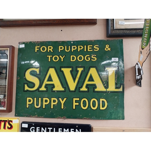 151 - Saval Puppy Food for puppies and toy dogs enamel advertising sign. {32 cm H x 71 cm W}.