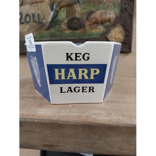 154 - Harp Keg Lager Wade ceramic advertising ashtray. {8 cm H x 19 cm Dia.}.