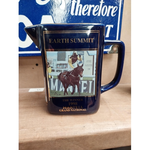 158 - Set of three graduated Martell Grand National winners ceramic water jugs. {15 cm H  to 13 cm H}.