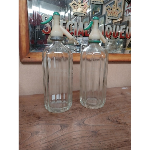 16 - Two Dublin Mineral Waters glass siphons. {20 cm H}.