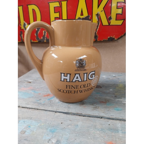 161 - Haig Scotch Whiskey Carltonware ceramic water jug. {15 cm H x 15 cm W x 12 cm D}.