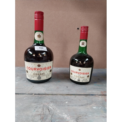 165 - Two bottles of Courvoisier Brandy with contents.