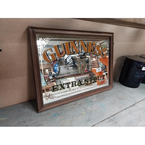 166 - Framed Guinness Extra Stout advertising mirror. {34 cm H x 47 cm W}.