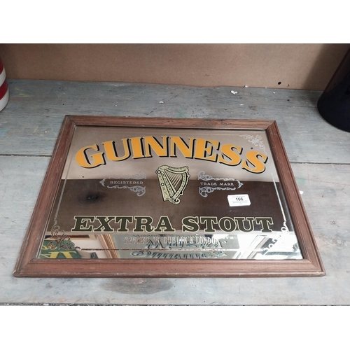 166 - Framed Guinness Extra Stout advertising mirror. {34 cm H x 47 cm W}.