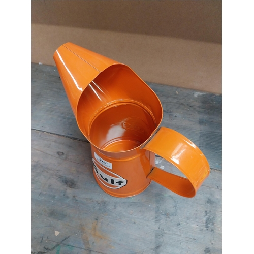 170 - Gulf Petrol tinplate graduated measuring jugs. {27 cm H x 35 cm W x 14 cm D}, {18 cm H x 18 cm W x 1... 