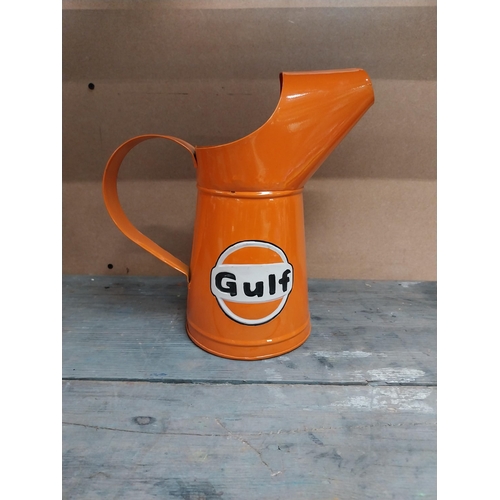 170 - Gulf Petrol tinplate graduated measuring jugs. {27 cm H x 35 cm W x 14 cm D}, {18 cm H x 18 cm W x 1... 