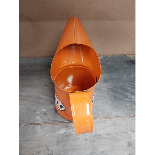 170 - Gulf Petrol tinplate graduated measuring jugs. {27 cm H x 35 cm W x 14 cm D}, {18 cm H x 18 cm W x 1... 