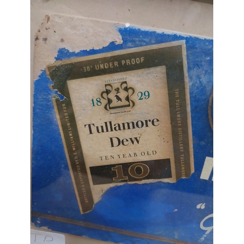 185 - Tullamore Dew Give Every Man His Dew framed showcard. {25 cm H x 40 cm W}.