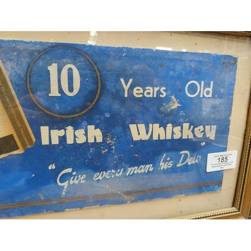 185 - Tullamore Dew Give Every Man His Dew framed showcard. {25 cm H x 40 cm W}.