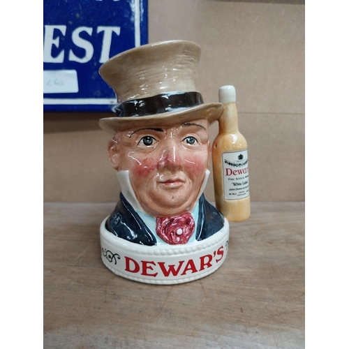 190 - Two Royal Doulton Captain Cook Bourbon and Mr McCawber Dewars Whiskey ceramic advertising figures. {... 