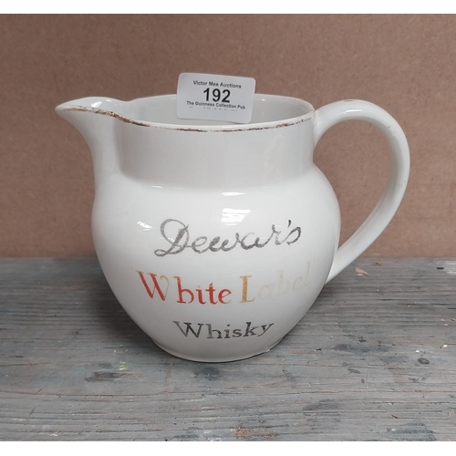 192 - Dewars White Label Whisky {10 cm H }and Johnny Walker Whisky {13 cm H} ceramic water Jugs