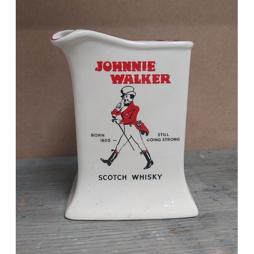 192 - Dewars White Label Whisky {10 cm H }and Johnny Walker Whisky {13 cm H} ceramic water Jugs