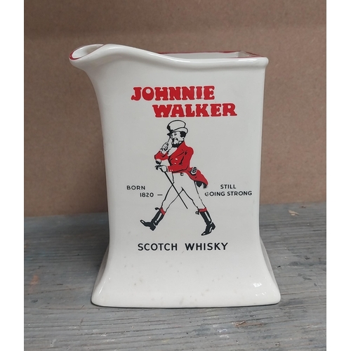 192 - Dewars White Label Whisky {10 cm H }and Johnny Walker Whisky {13 cm H} ceramic water Jugs