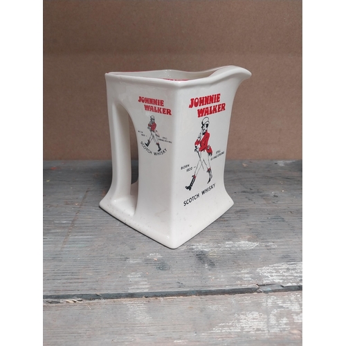 192 - Dewars White Label Whisky {10 cm H }and Johnny Walker Whisky {13 cm H} ceramic water Jugs