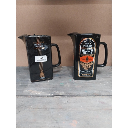 200 - Two Bushmills Black Bush Whiskey ceramic water jugs. {18 cm H x 14 cm W x 8 cm D}.