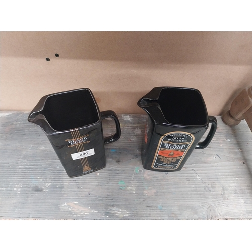 200 - Two Bushmills Black Bush Whiskey ceramic water jugs. {18 cm H x 14 cm W x 8 cm D}.