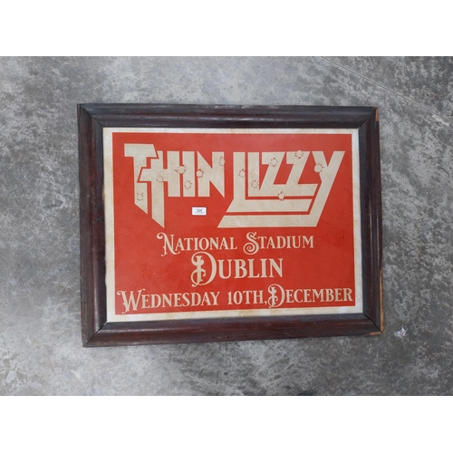 205 - Framed Thin Lizzy print. {69 cm H x 85 cm W}.