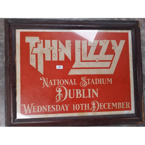 205 - Framed Thin Lizzy print. {69 cm H x 85 cm W}.