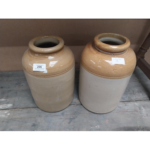 206 - Two 19th C stoneware storage jars. {31 cm H x 17 cm Dia.} and {27 cm H x 16 cm Dia.}.