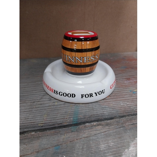 209 - Guinness ashtray {4 cm H x 15 cm W x 15 cm D} and Guinness match strike. {10 cm H x 14 cm Dia.}.