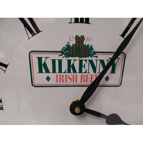 214 - Mahogany and brass Kilkenny Irish Beer battery wall clock. {38 cm Dia.}.