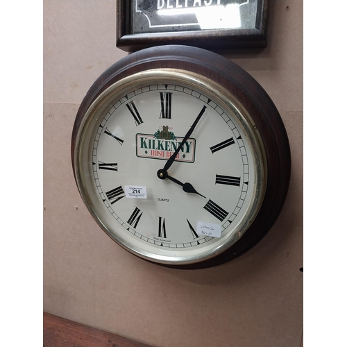 214 - Mahogany and brass Kilkenny Irish Beer battery wall clock. {38 cm Dia.}.