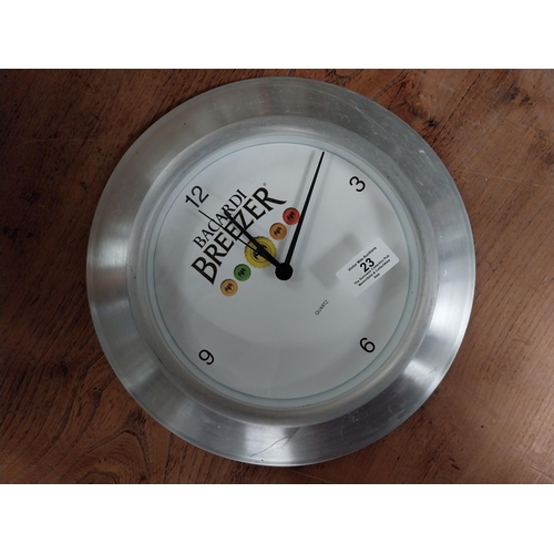 23 - Bacardi Breezer advertising battery clock. {30 cm Dia. }