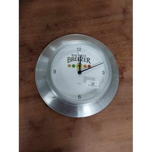 23 - Bacardi Breezer advertising battery clock. {30 cm Dia. }