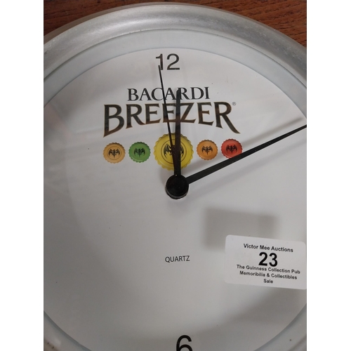 23 - Bacardi Breezer advertising battery clock. {30 cm Dia. }