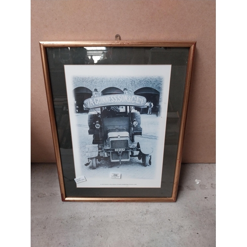 230 - Framed black and white print Guinness and Son 1909 Daimler delivering casks. {56 cm H x 43 cm W}.