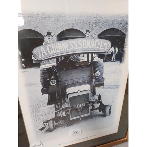 230 - Framed black and white print Guinness and Son 1909 Daimler delivering casks. {56 cm H x 43 cm W}.