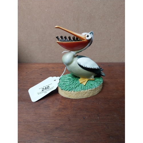 240 - Two Guinness figures Toucan weathervane {17 cm H x 9 cm W x 7 cm D} and ceramic Pelican. {10 cm H x ... 