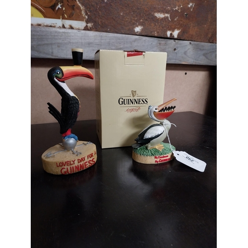 240 - Two Guinness figures Toucan weathervane {17 cm H x 9 cm W x 7 cm D} and ceramic Pelican. {10 cm H x ... 